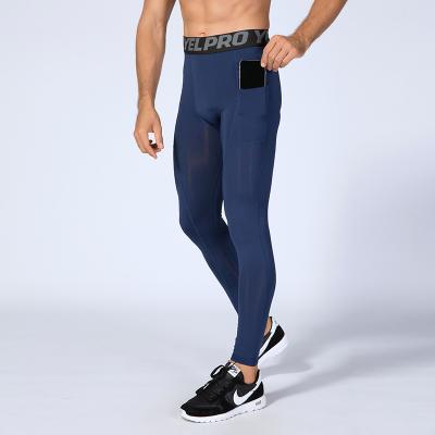 China Active Men Gym Yoga Pants Compression Running Breathable Gaiters Wear Fitness Legging With Side Pockets for sale