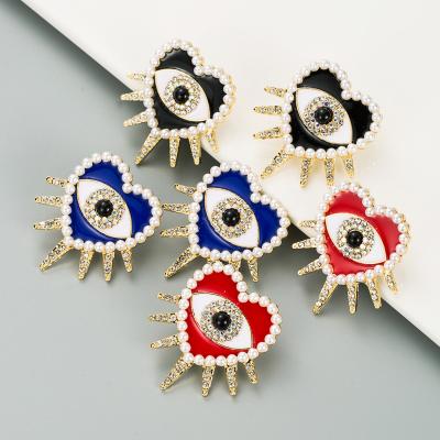 China TRENDY Fashion Overstated Heat Enamel Shape Stud Earrings Women Vintage Rhinestone Eye Stud Earrings Jewelry for sale