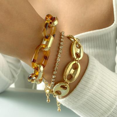 China Best Selling Punk Acrylic Lock Clasp Bracelet Pig Nose Coffee Beans Bangle Gold Plated Gold Plated Bangle Set BA-374 for sale