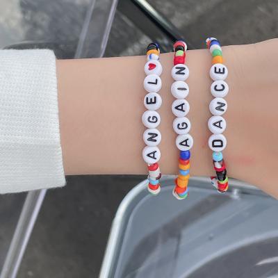 China Hot Selling Stackable Punk Bangle English Bohemian Letter BA-373 Colorful Seed Beads Elastic Bracelet For Women Girls for sale