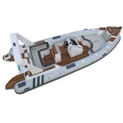 China Remarkabl Quality China Hot Selling Fiberglass Rigid Hull Inflatable Fiberglass Rib Boat With Outboard Engine for sale