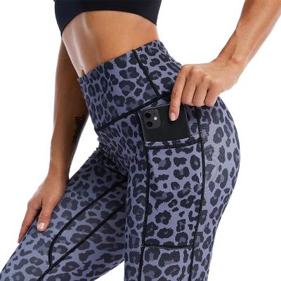 China QUICK DRY Custom Compression Leggings Sport Leopard Print Butt Lift High Waist Yoga Pants Women's Gaiters With Pockets for sale