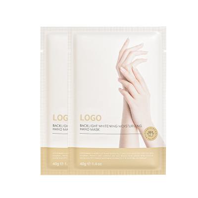 China Whitening Hot Sale Moisturizing Gloves Exfoliating Whitening Moisturizing Organic Nourishing Hand Sheet Hand Mask 10 Pairs for sale