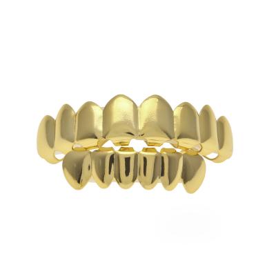 China Comfort Fit Upper 8 Teeth Grillz Real Gold Plated Punk Teeth Say Gold Dental Lip Grillz For Women Men Body Jewelry for sale