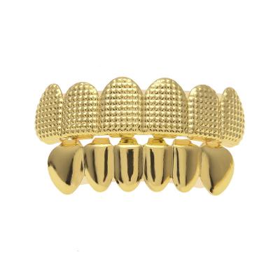 China Comfort Fit 6 Top Real Plaid Texture Teeth Grillz Gold Plated Punk Teeth Say Gold Dental Lip Grillz For Women Men Body Jewelry for sale