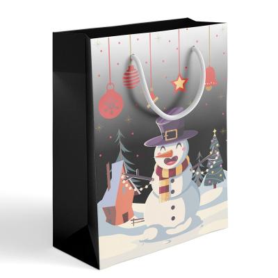 China Handmade Manufacturer Christmas Theme Gift Bag Card Paper Packaging White Paper Bags For Party Present for sale