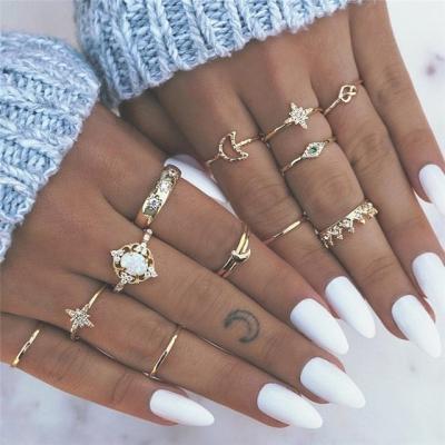 China TRENDY Hollow Love Butterfly Female Ancient Silver Ring Set Pearl Gold Snake Drip Oil Ring Jewelry  Stacking Rings set for sale