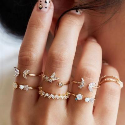 China TRENDY Stainless Steel Shiny Zircon Stacking Evil Eyes Flower Gold Plated Adjustable Wedding Finger Rings Open Cuff Chain Rings for sale