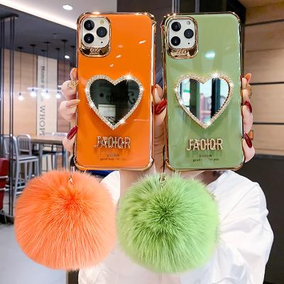 China Mirror Shockproof Luxury Red Silicone Makeup Heart Love Heart Soft Phone Case For iPhone 12 Phone Case With Hairball for sale