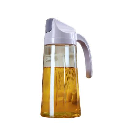 China 630ml Food Customized Oil Bottle Kitchen Glass Bottle Glass Oil Jug With Handle for sale