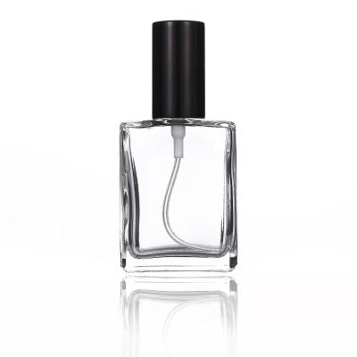 China 15ml Square Mini Clear Empty Perfume Glass Cosmetic Explosive Flat Bottle With Black Silvery Cover for sale