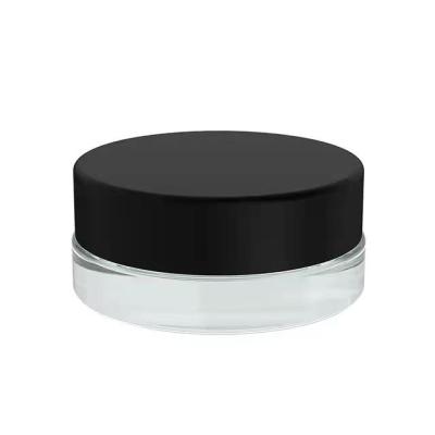 China Mini Glass Bottle Cosmetic Cosmetic Face And Eye Cream Glass Bottle With Black Lid for sale