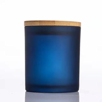 China Amber Glass Candle Jar Home Decoration Empty Wide Glass Jar Bottle Mouth Wooden Lid for sale