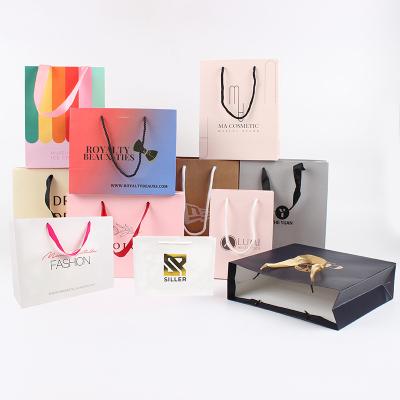 China Custom Logo Luxury Carton Boutique Retail Christmas Recyclable and Biodegradable Gift Box Apparel Packaging Shopping Bag Gift Bag for sale