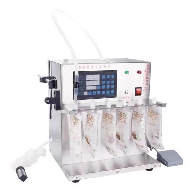 China Semi-automatic Suction Stand-up Spout Food Pouch Filling Machine Packaging Machine for sale