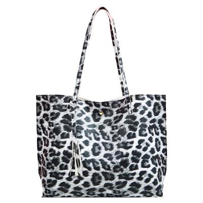 China Large capacity the best designer lady leopard pattern tassel beach fashion handbag shoulder tote bag large capacity for sale