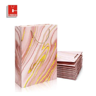 China Recyclable Custom Logo Printed Pink Gold Small Private Personalized Tote Gift Paper Bags With Twine Rope Luxury Shopping Handles for sale