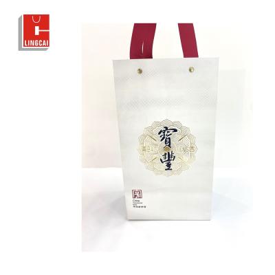 China Recyclable Custom Logo Luxury Gift Garment Paper Shopping Bags With Handles for sale