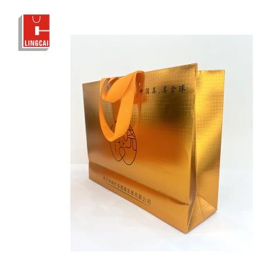 China Recyclable Luxury High Quality Custom Printed White Logo Gold Stamping Gift Paper Shopping Gift Bags With Handle for sale