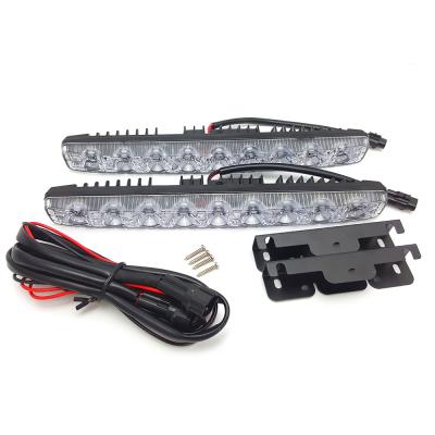 China Waterproof Aluminum Case 9LEDs DRL Daytime Running Driving Fog Lights For Lighting System Car Foglamp 6000K Automotive Lighting for sale