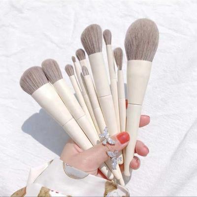 China Luxury Portable Travel Bottle 12pcs Glitter Handle Makeup Brush Kit Case Bucket Quantity OEM Customized Tools Logo Beauty PCS for sale