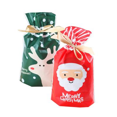 China Recyclable Cookie Snowflake Candy Bag Drawstring Ribbon Gift Bag New Deer Santa Claus Pouch Package Crunchy Bag for sale