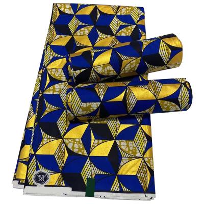 China Real African Fabric Shrink-Resistant Gold Hollandais Wax Print Ankara and Kente Style African Cotton Knit Fabric for Skirts for sale