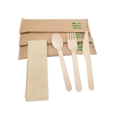 China Disposable Degradable Disposable cutlery bag wrap wood cutlery set with napkin custom logo on spoon fork knife for sale