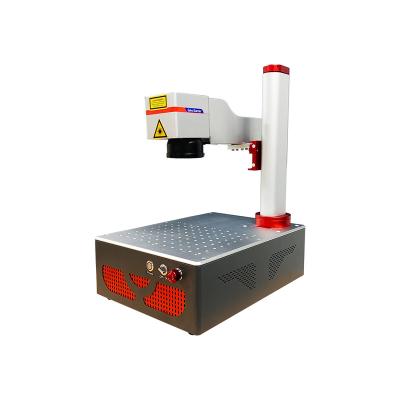 China 22KG 30W Mini Small Portable Laser Engraving Light Weight All-in-one Machine for Industrial Jewelry for sale