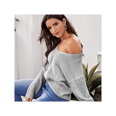 China Hot Selling High Quality Breathable Autumn New Sexy Off Shoulder Knit Sweater Solid Color Loose Doll Sleeve Knit Top for sale