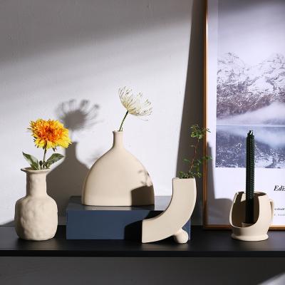 China Wholesale Modern Irregular Nordic Home Decor Artistic Matte Flower Arrangement Ceramic White Vase for sale