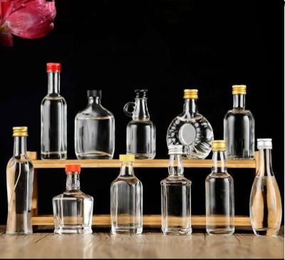 중국 30ml 40ml 50ml 100ml Mini Small Sample Alcohol Juice Drinks Glass Wine Liquor Bottle with Screw Cap 판매용