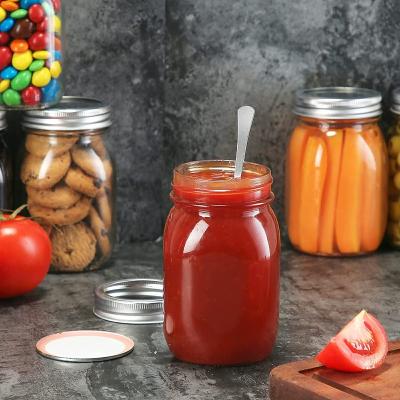 Cina 4oz 8oz 16oz 32oz Glass Jam Peanut Butter Jar Regular Mouth Wide Mouth Glass Mason Jars with Metal Lids For Food Storage in vendita