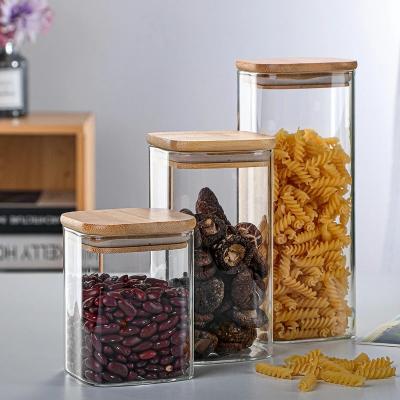 Κίνα Kitchen Storage Wood Lid Glass Airtight Canister Bottles For Grains Tea Coffee Beans Grains Candy προς πώληση