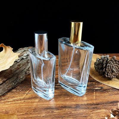 China Wholesale unique shape custom made flat square glass perfume bottle 30ml 50ml with Aluminum spray atomizer à venda