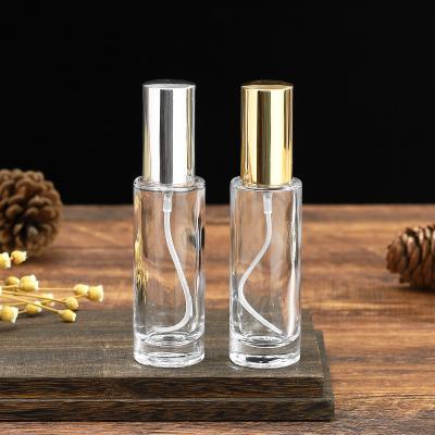 China 30ml Travel portable atomizer spray glass perfume bottle cylinder shape glass bottle à venda