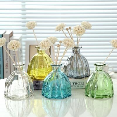 China Reed Diffuser Glass Bottle Empty Unique Essential Oil Perfume Glass Diffuser Bottles with Cork Lids Te koop