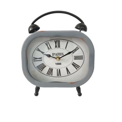 China Cheap Price Retro Metal Craft Table Clock Factory Alarm Style Bedroom Style High Quality Custom Funny Clock European Antique Desk For Sale for sale