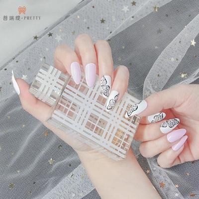 China Professional Wholesale Design Press On Nails Stylish Pink Long Coffin Finger Nail Tips for sale