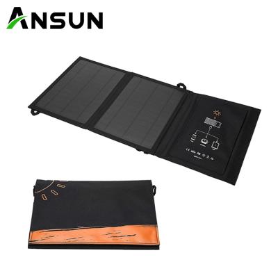 China Voltage Regulation/Intelligent Recognition/Auto Resume Most Popular Dual Usb Foldable Portable Outdoor Charger Phone Solar Charger For Camping for sale