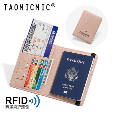 China TAOMICMIC Wholesale Fashion Factory Price Multifunctional PU Passport Holder Wallet Case Travel Wallet Leather RFID Blocking for sale