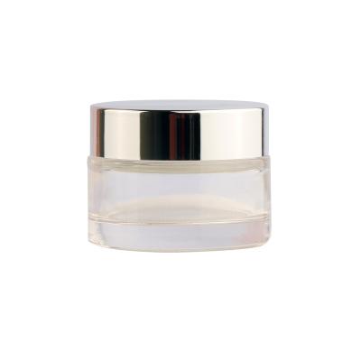 China Customed personal care logo forsted small clear glass jar sets cosmetics cream jars and bottle with white/black/silver lids for sale