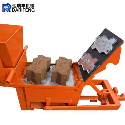 China Interlocking clay pressed earth block brick machine QMR2-40 manual brick making machine for sale