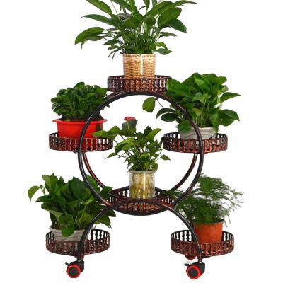 China Modern Vertical Stand For Wrought Iron Flower Pot Stand Removable Flower Pot Rack With Wheel For Living Room for sale