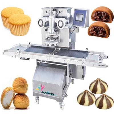 China Automatic Food Processing Machine Biscuit Biscuit Encrusting Tray Arranging Machine Stuffed Puff Cupcake Making Machine Production Line for sale