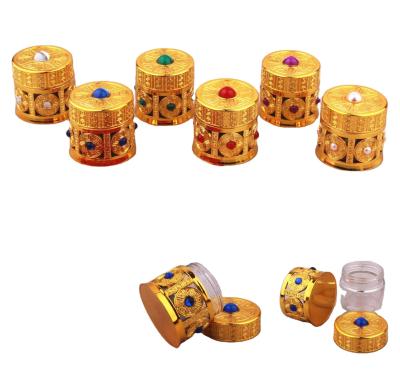 China 2019 10g Saffron Stocked Luxury Gold Glass Jar With Screw Lid And Colorful Bead for sale