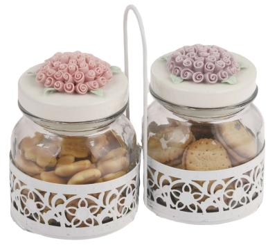 China 2pcs 650ml Freshness Preservation Glass Jar With Ceramic Lid In Metal Basket for sale