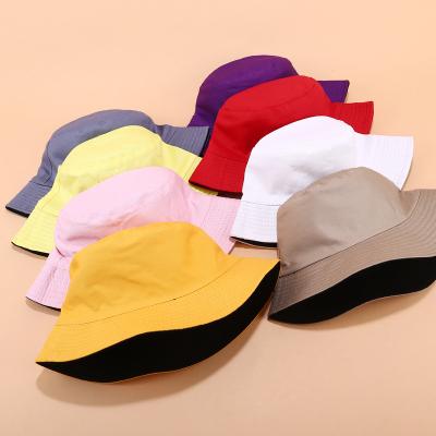 China Custom Wholesale Stock Double Sides Bucket Hats Popular Colored Picture Volume for sale