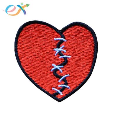 China Viable custom design red iorn on small embroidered patch of broken heart for sale