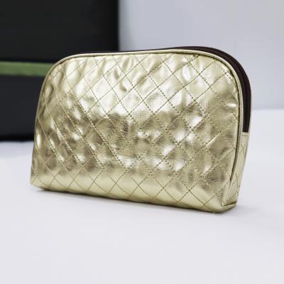 China Recyclable Custom Fashionable Golden Makeup Storage Bag With Company Logo Large Capacity Travel Makeup Wash Bag for sale